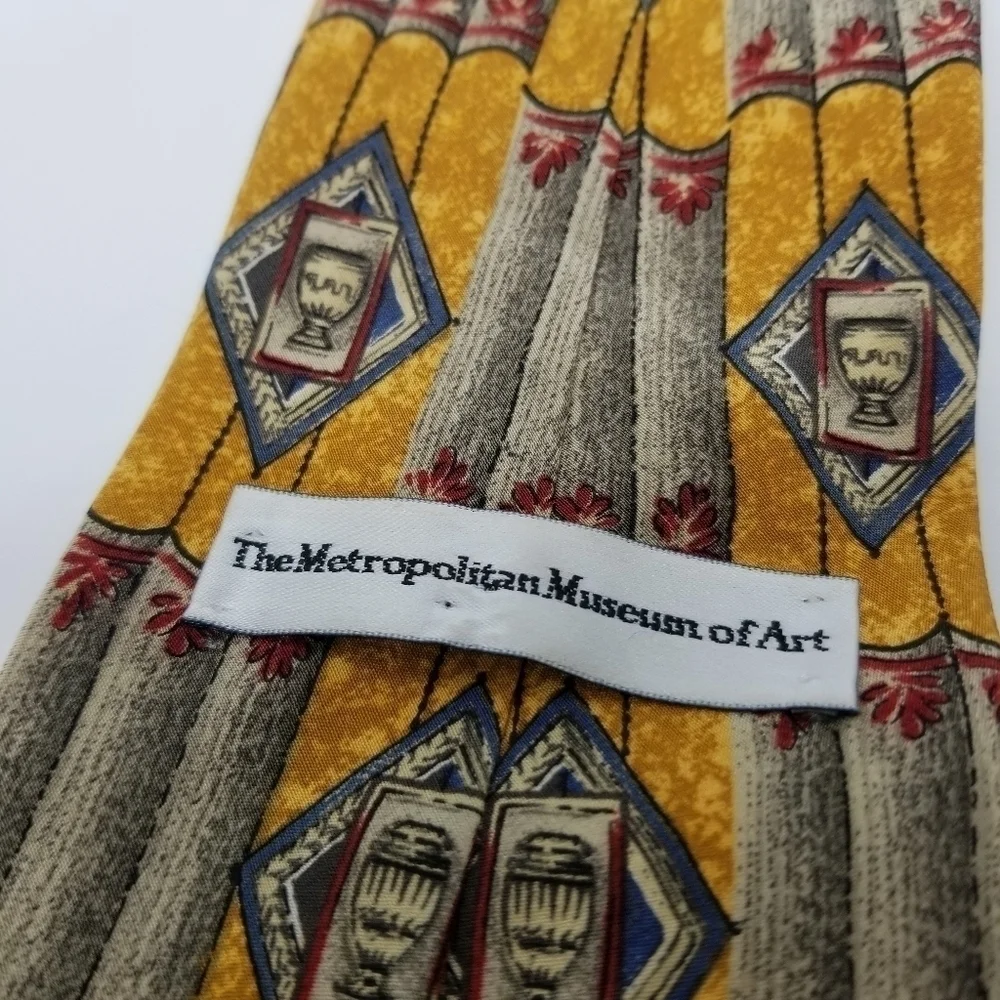 Metropolitan Museum of Art tie yellow columns grecian urn